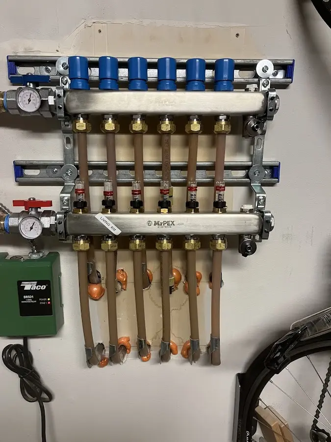 Plumber performing Water Heater Repair at a residential property in Haltom City